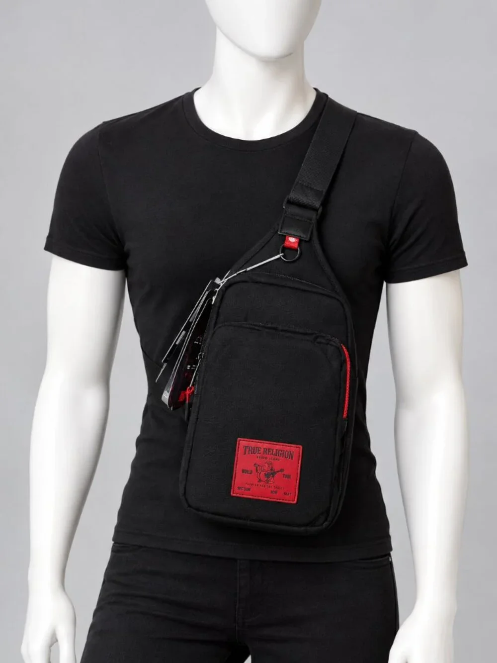 True Religion Sling Bag Features a Textured Brand Patch Durable Nylon With Red